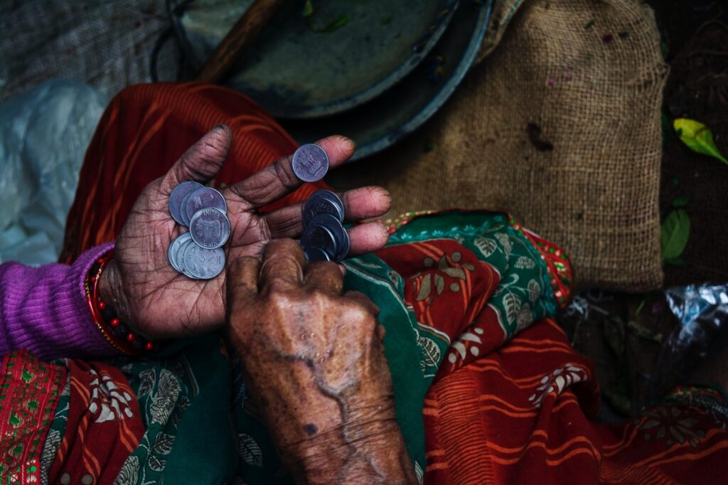 woman holding coins